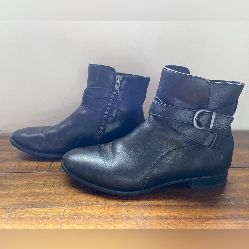 Born brand, black leather zip-up, mid-height flat boot. Size 7.5